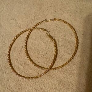 Twisted gold large hoop earrings